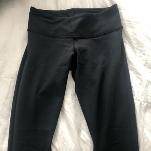 Lululemon size 4 leggings, below the knee length